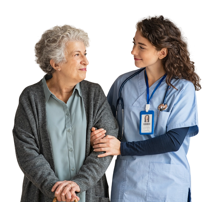 Nurse compassionately assisting elderly patient at home